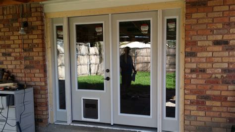 french door with doggie door built in